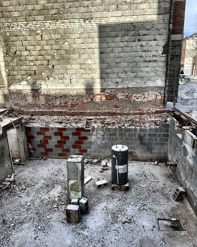 Ground floor cleared down to the slab, ready to rebuild
