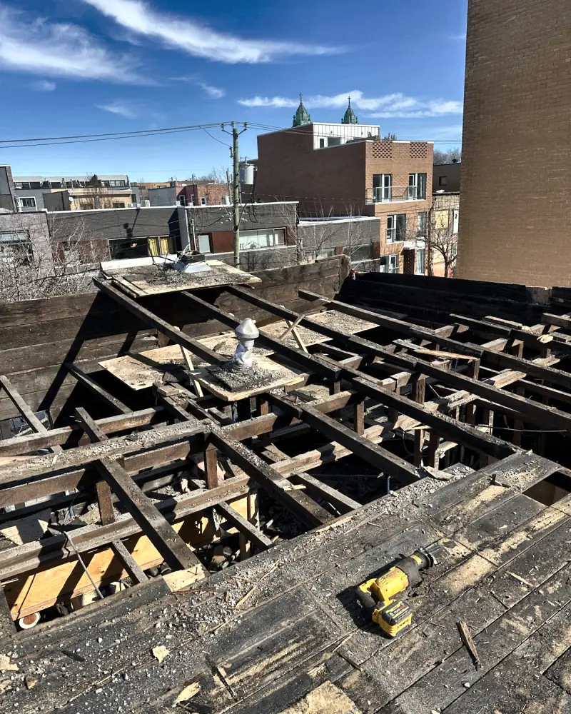 Roof demolition with the framing exposed